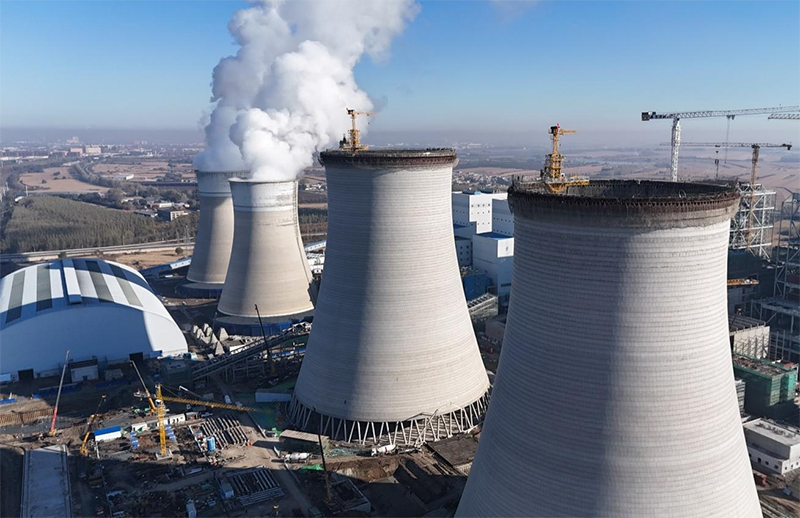筑頂冰城暖源！國能哈熱二期項目3號排煙冷卻塔順利封頂